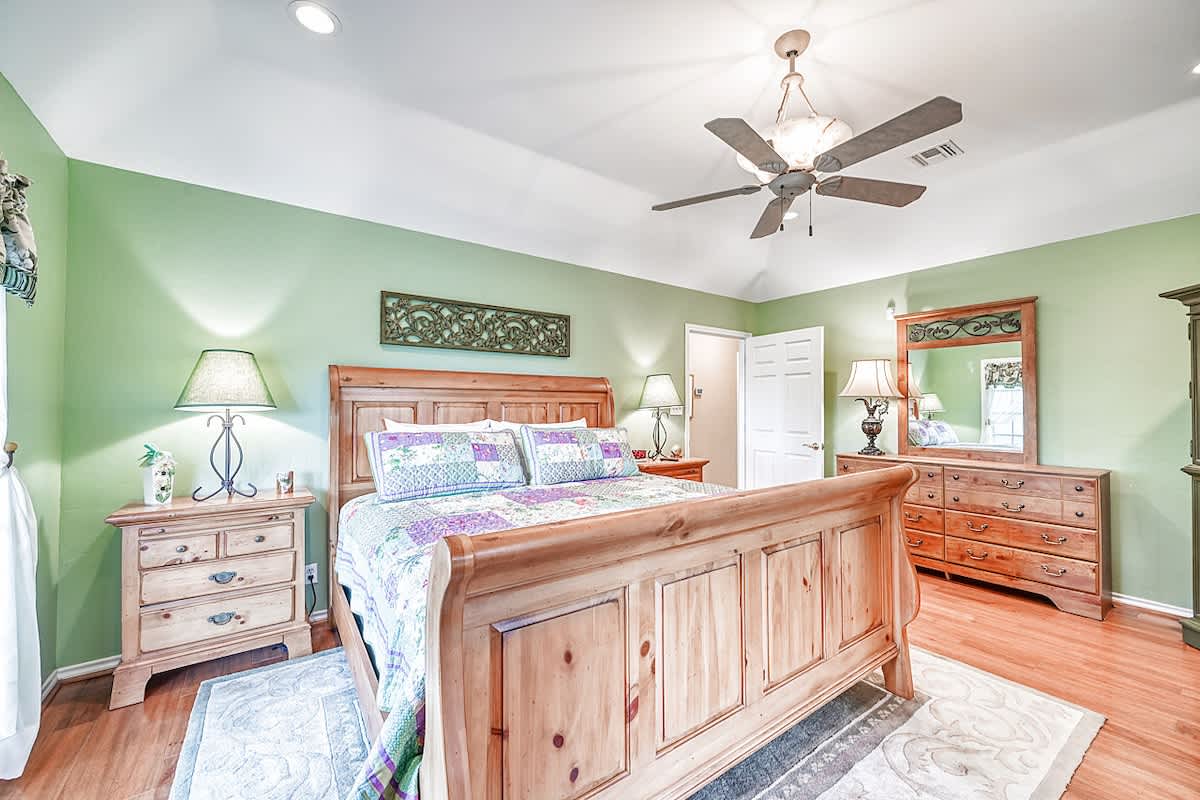 Master Bedroom with a cozy king bed for ultimate relaxation.