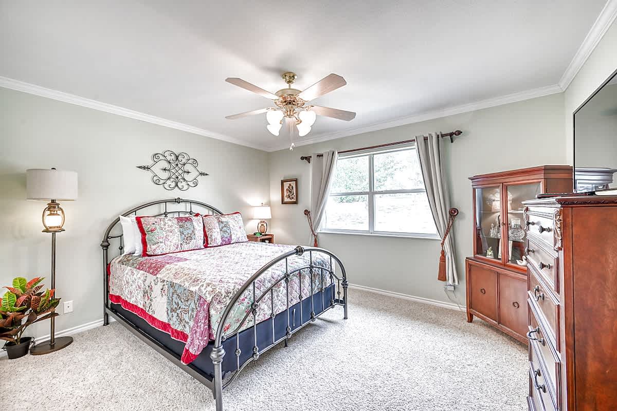 Third bedroom offers a queen bed with comfortable linens. 
