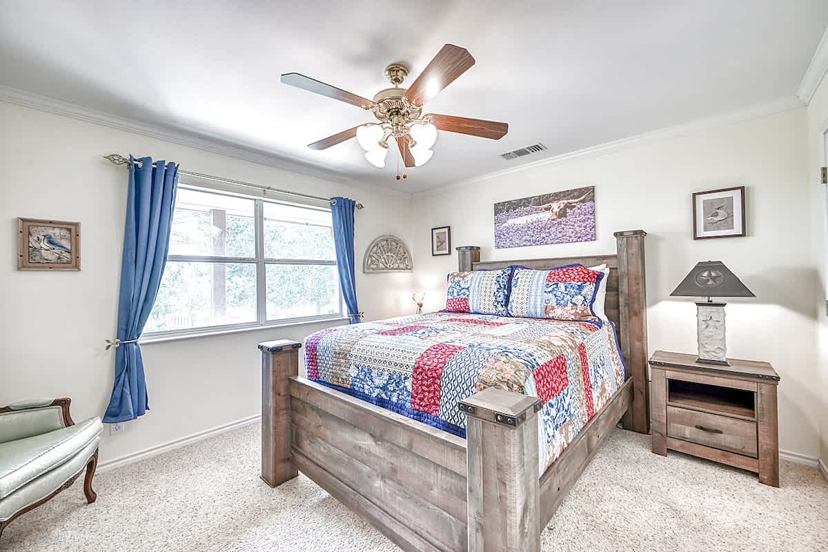 Second bedroom offers a cozy queen bed. 
