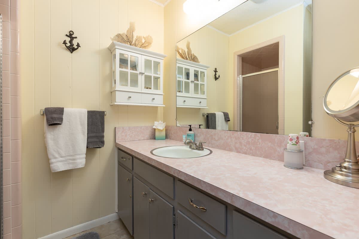 Master bathroom with standing shower.