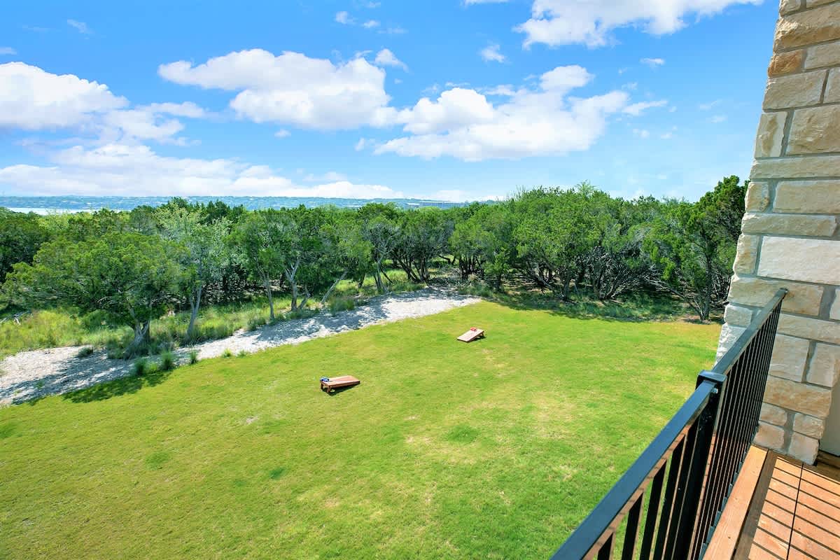 Additional photo of cornhole space.