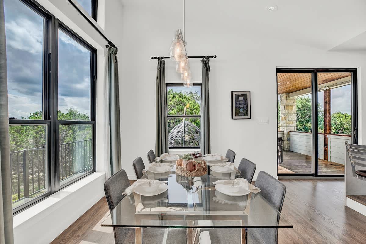 Enjoy a cozy meal with family or friends at this modern dining table that seats six.