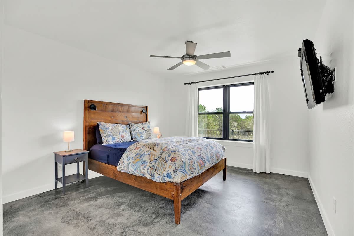 Relax in the comfort of bedroom 2, with its spacious layout and cozy queen bed.