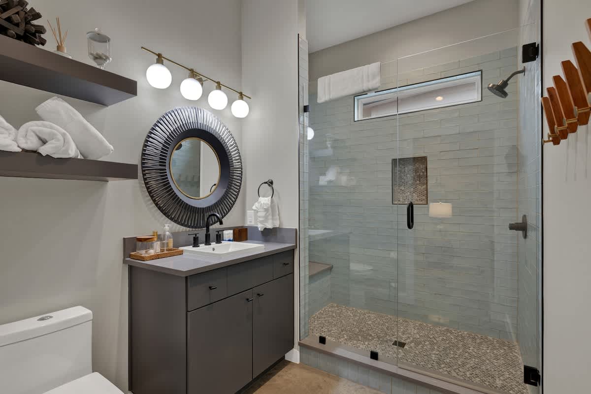 Full bathroom with spacious shower.