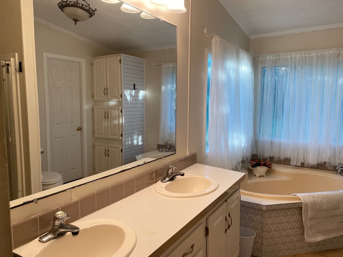 Main house - Master room full bath with stand alone shower and access to walk in closet