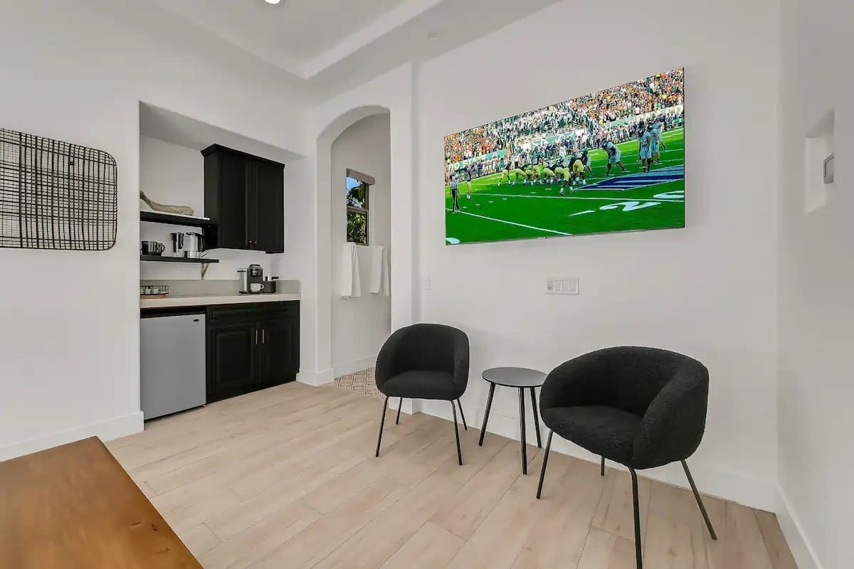 The casita includes a cozy sitting area and fully equipped kitchenette—perfect for extended stays or added privacy.