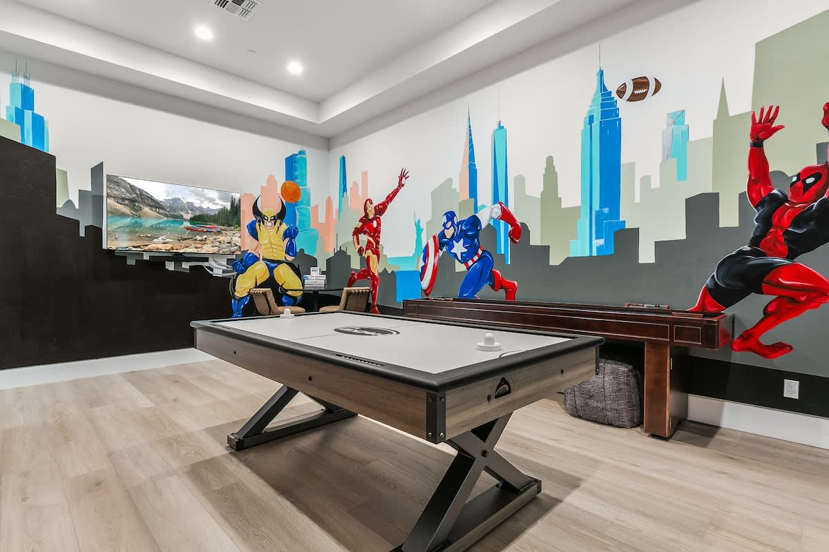 Game room with arcade games, air hockey, shuffleboard,Skeeball and basketball, Arcade games and board games