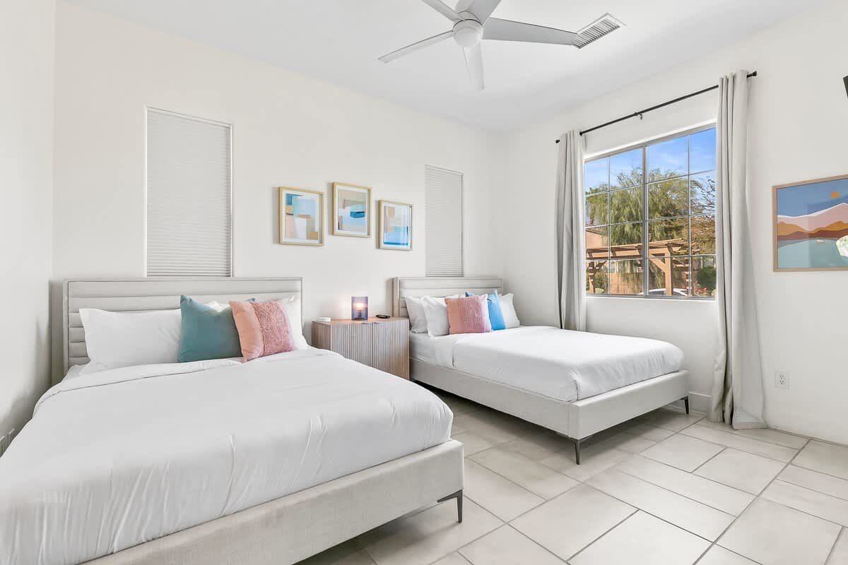 Two Queen beds with wall in closet and Ensuite bathroom