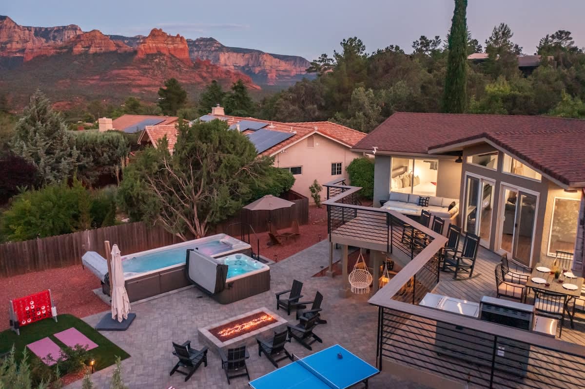 Massive views deck with full bartop railing. Decktop firepit and lower jumbo firepit. Relax and lounge above or below with tons of seating.
