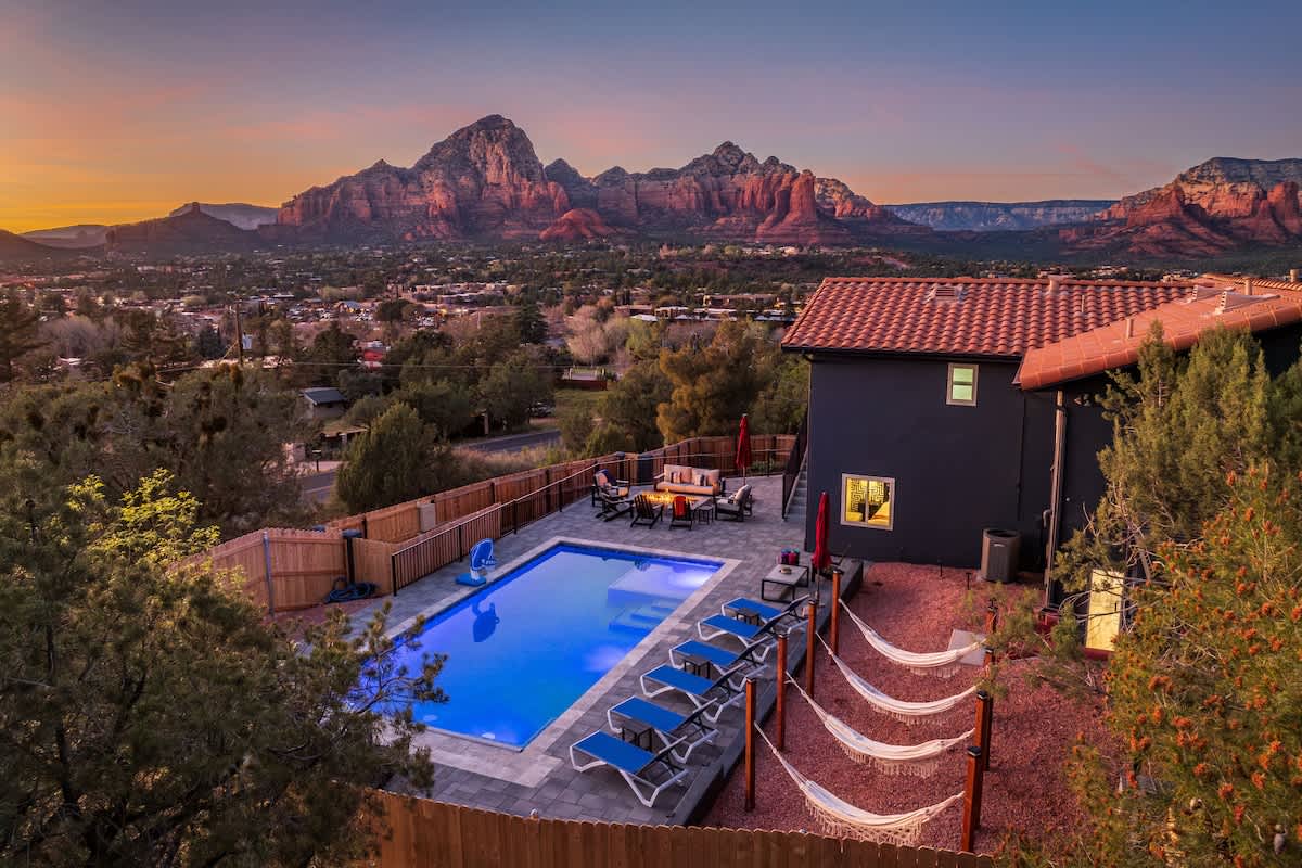 Huge pool, hammocks, loungers and Fire Pit with amazing views of Thunder Mountain and across Sedona. This property has space for everyone.