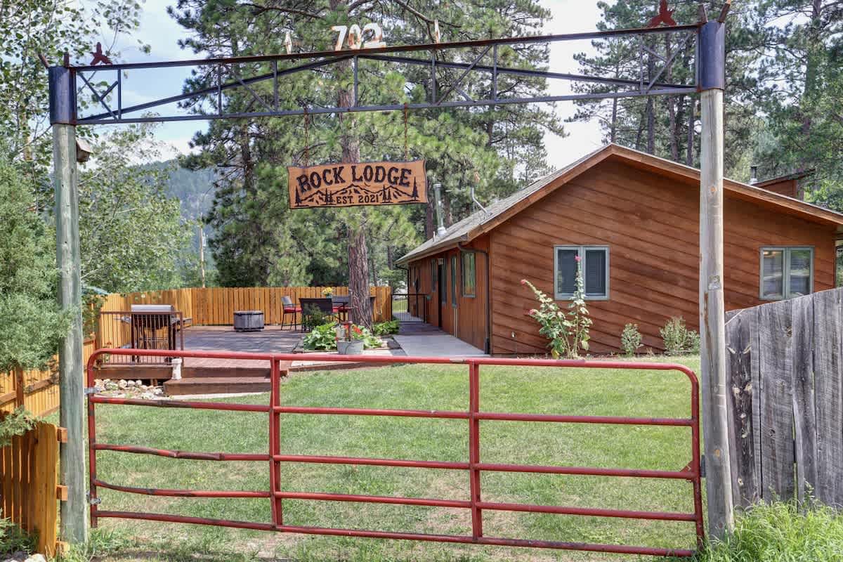Rock Lodge Complete with Covered Parking and a Hot Tub!