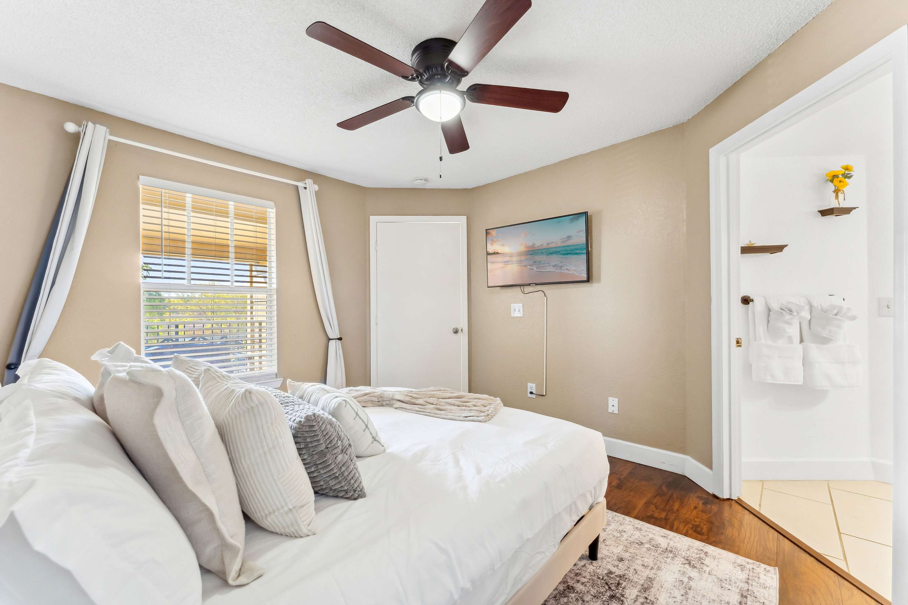 This luxe queen suite boasts a private ensuite & smart TV
