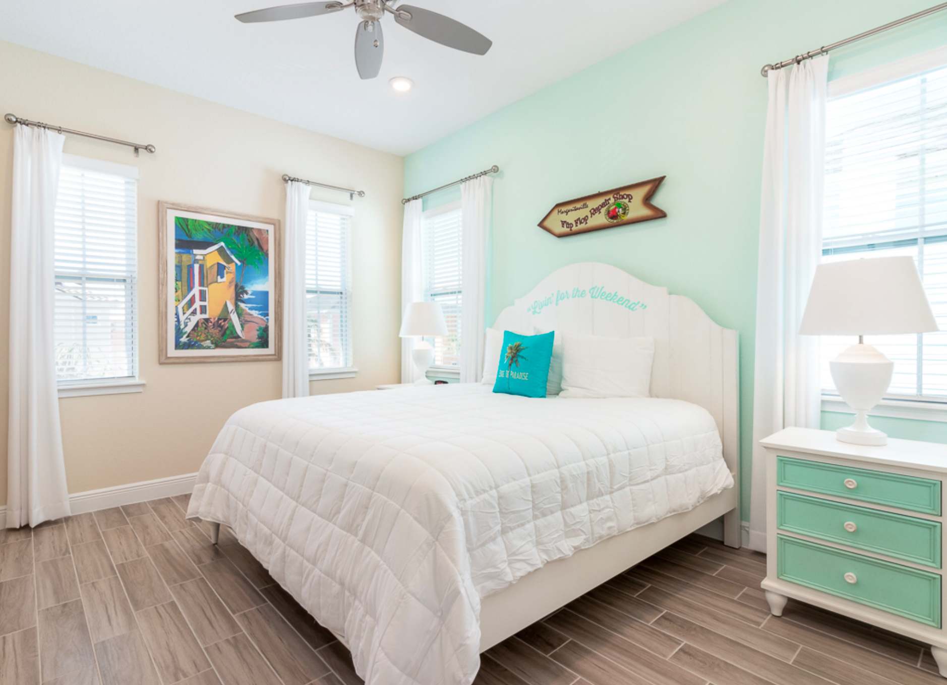 The king suite boasts a private ensuite, Smart TV, & ceiling fan