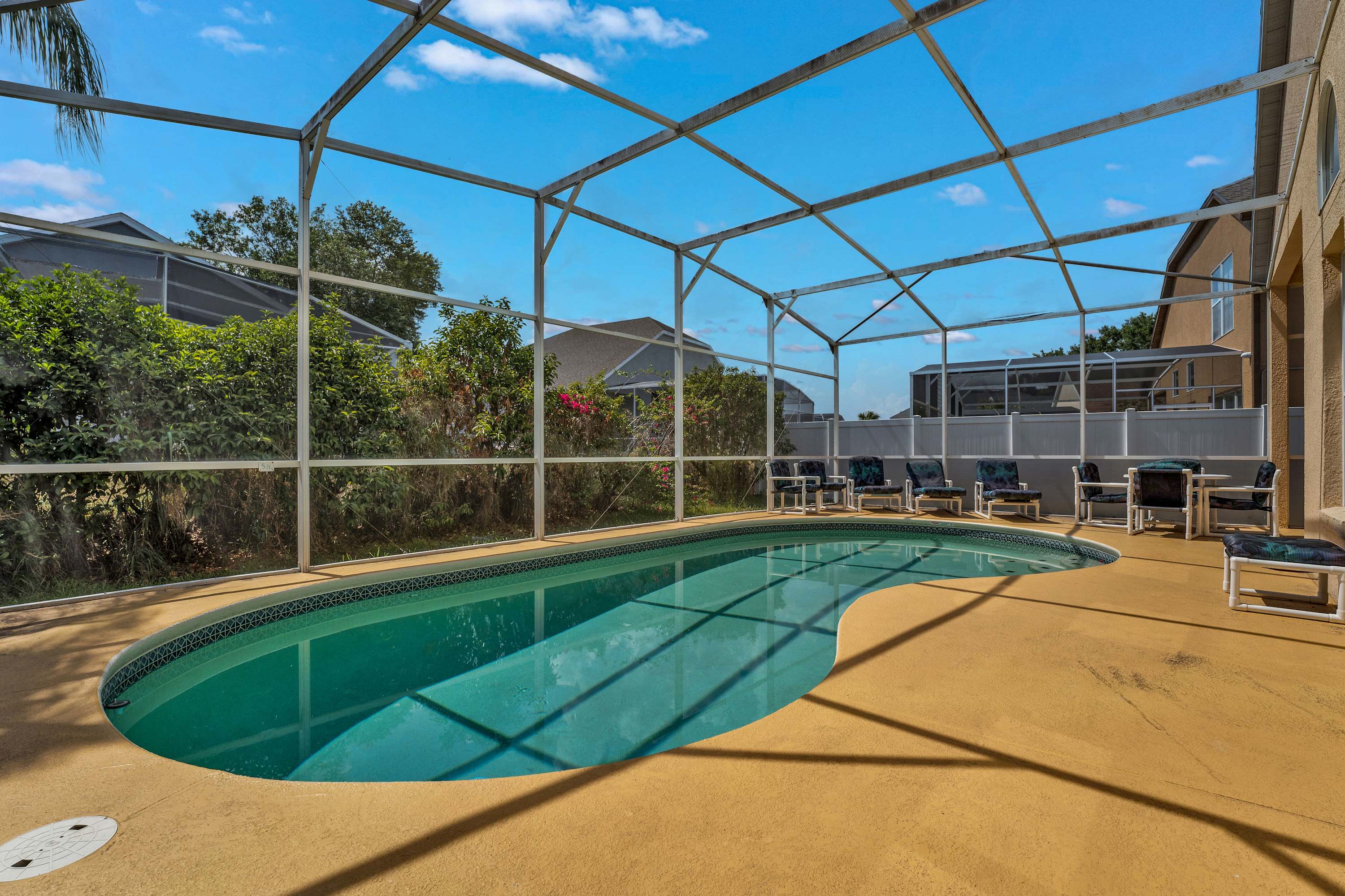 Relax by the private pool in a serene and sunny setting