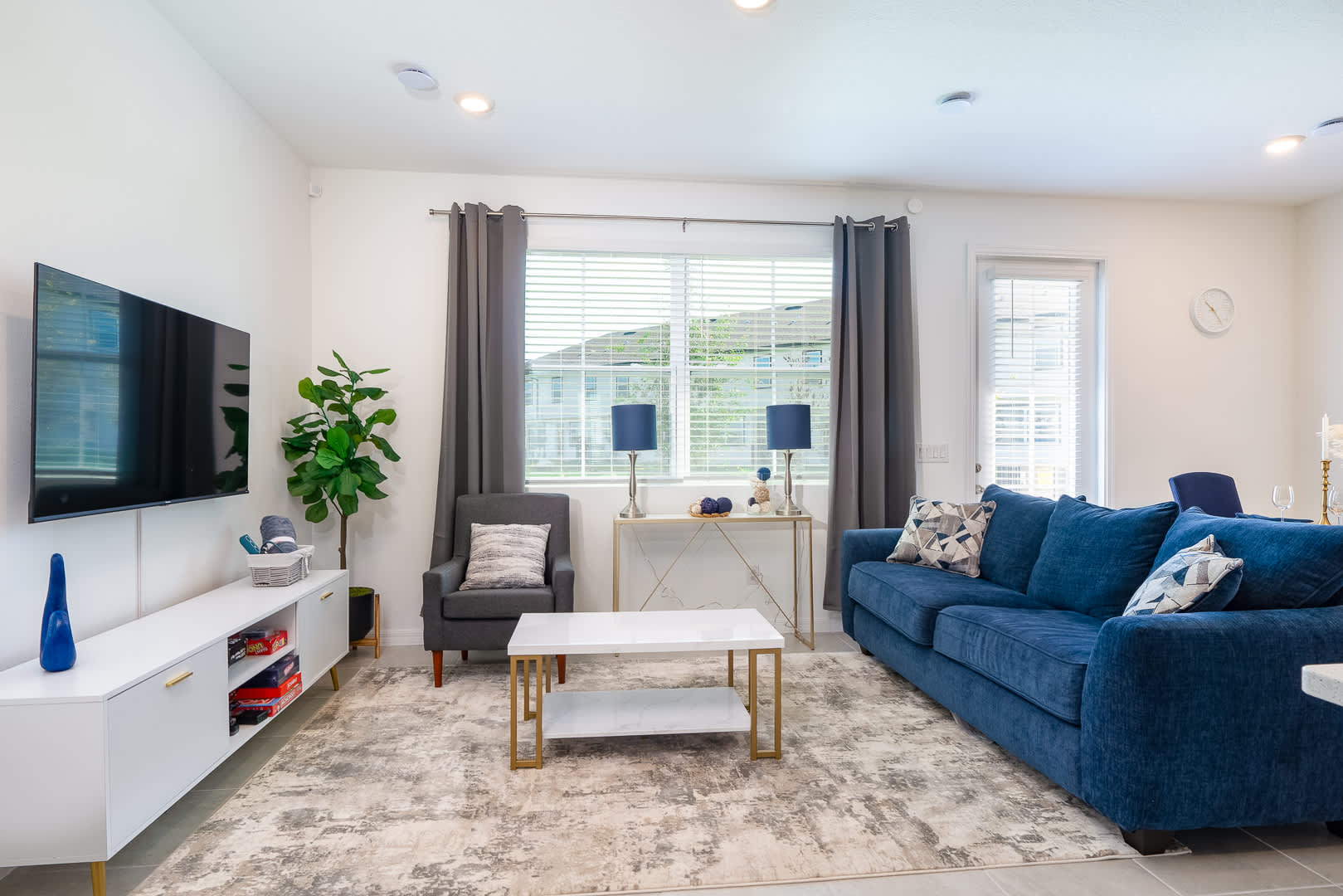 Curl up in the living room & enjoy a movie night in the sofa bed