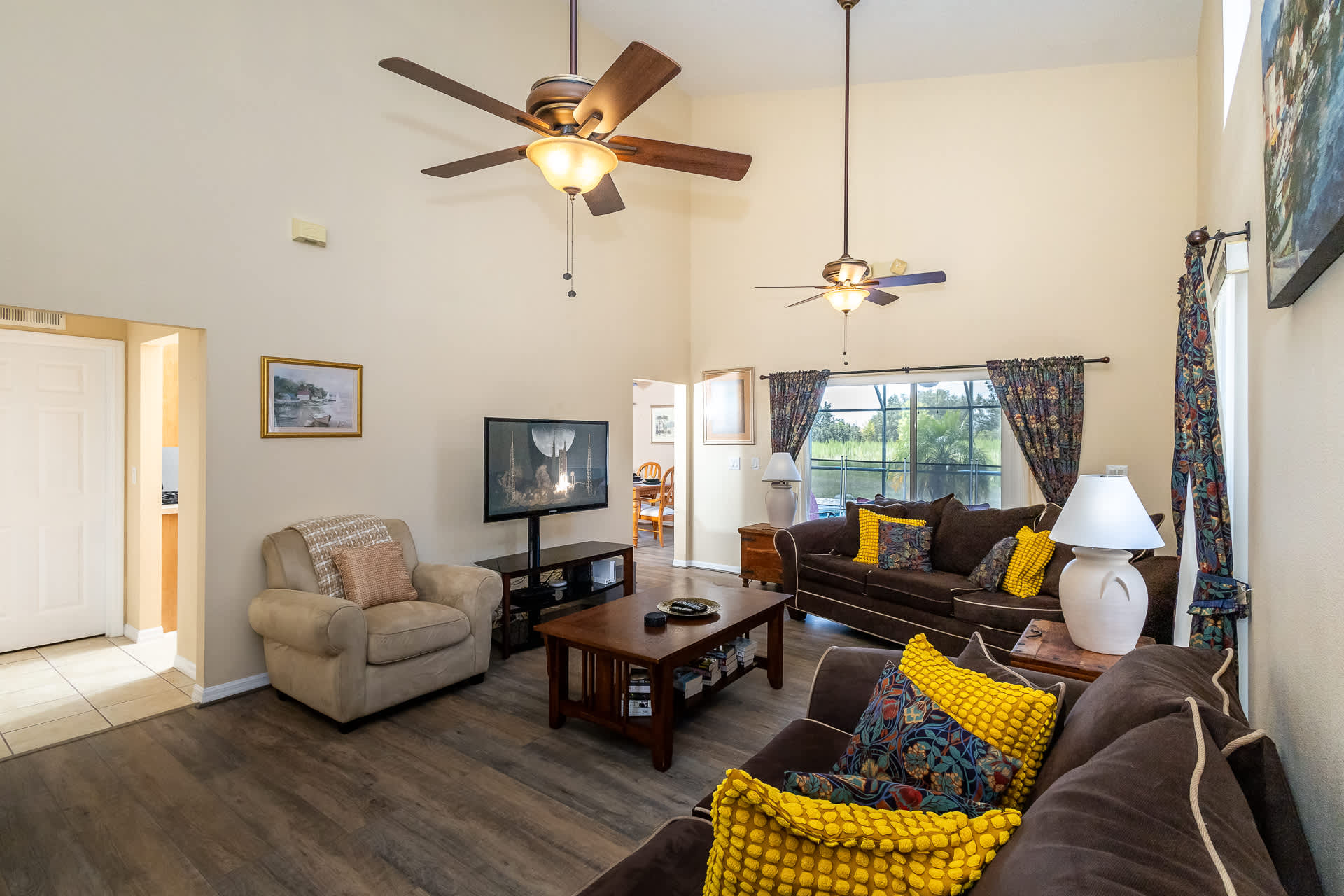 Cozy and spacious living area with TV