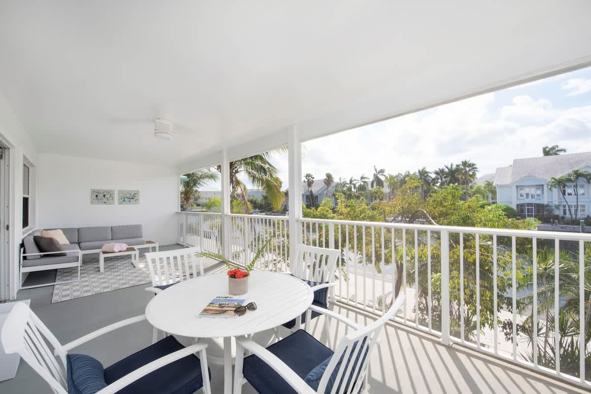 Snug Harbour View #8 – 2BR/2BA Canal Front Condo by Seven Mile Beach