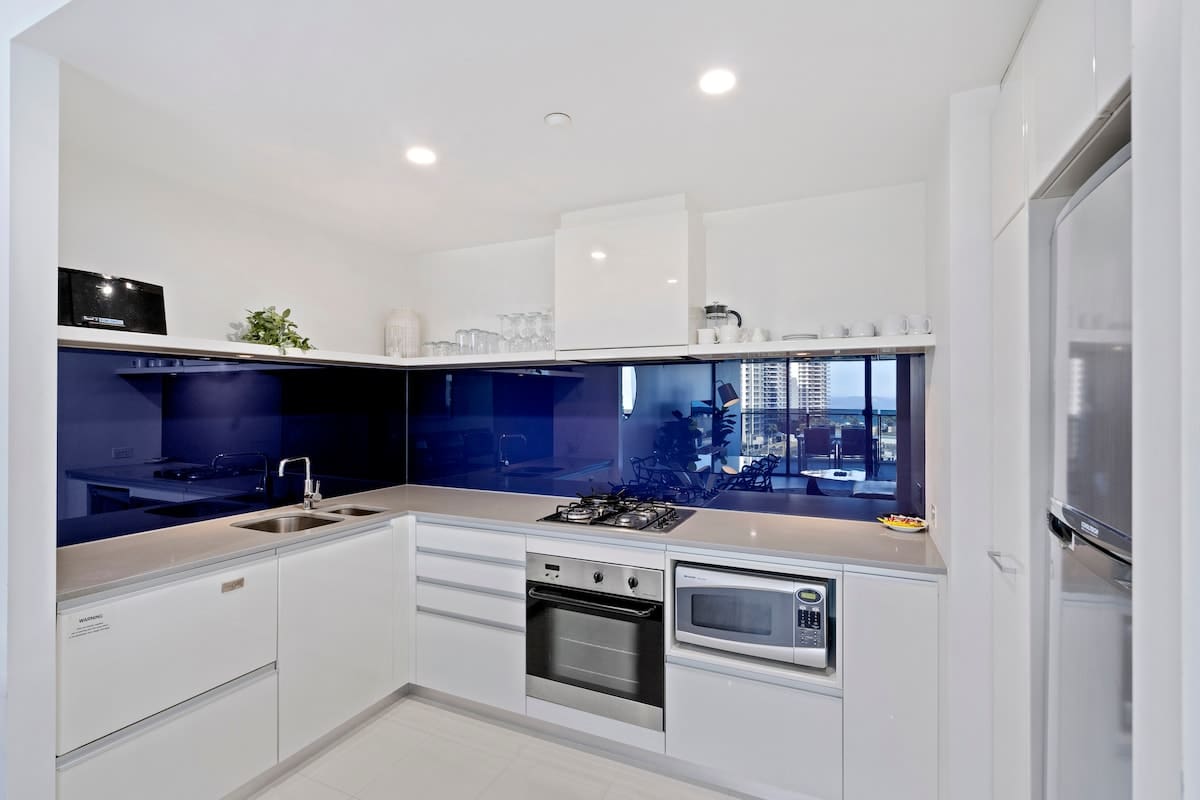 Spacious kitchen with modern appliances, stocked with cookware, dishware, and utensils/cutlery. Please note that we do not provide food items such as salt/pepper/oil. 