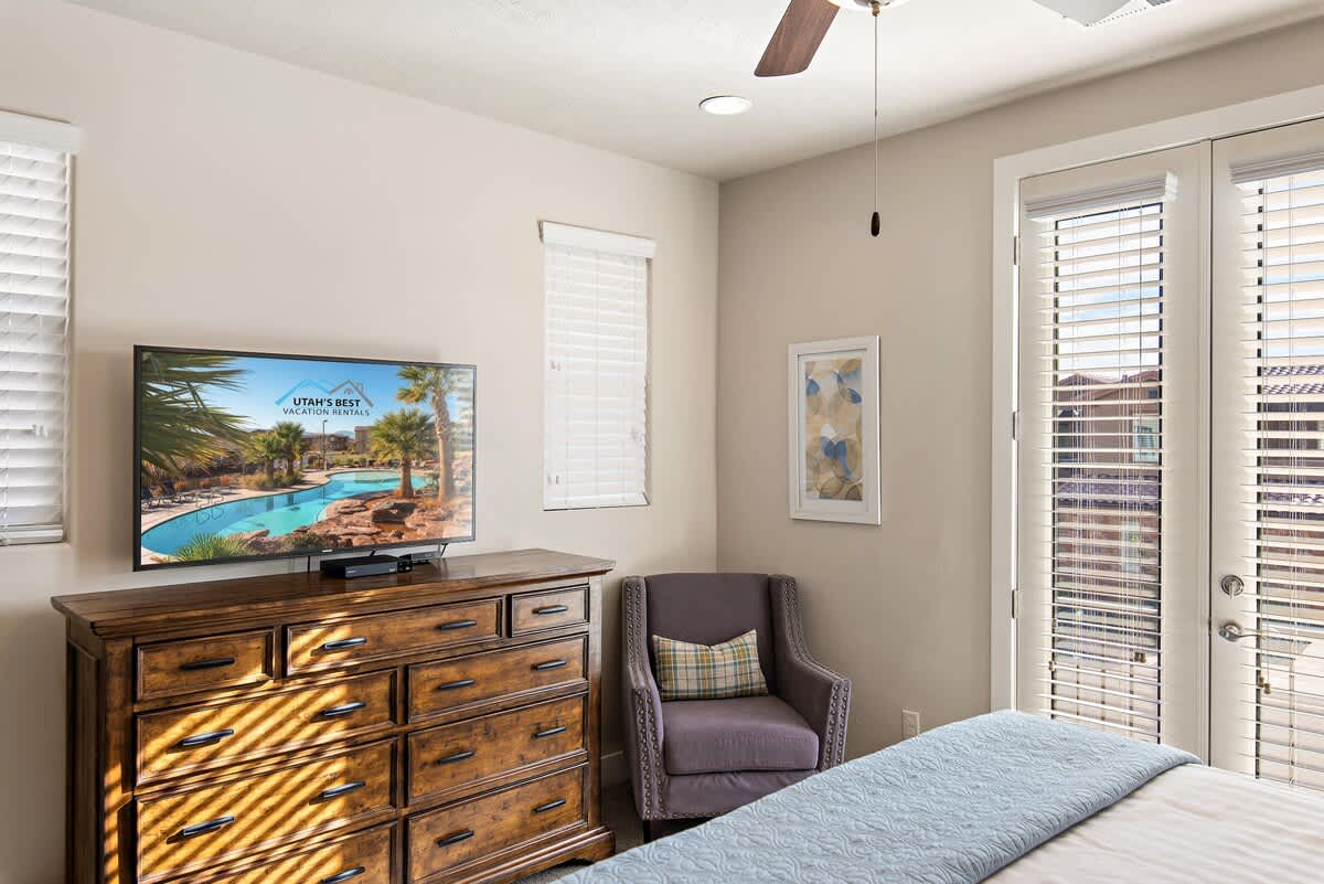 Bedroom 2 on 2nd floor with king bed and TV
