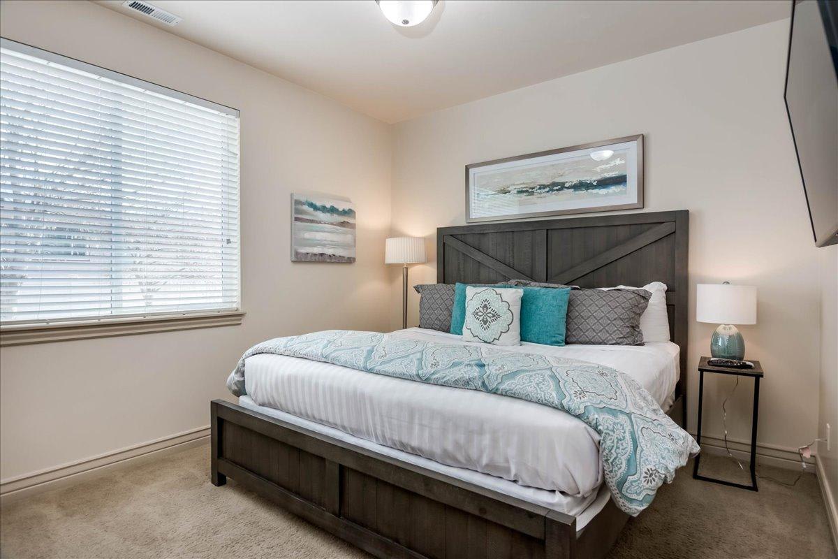 2nd bedroom with queen bed on main