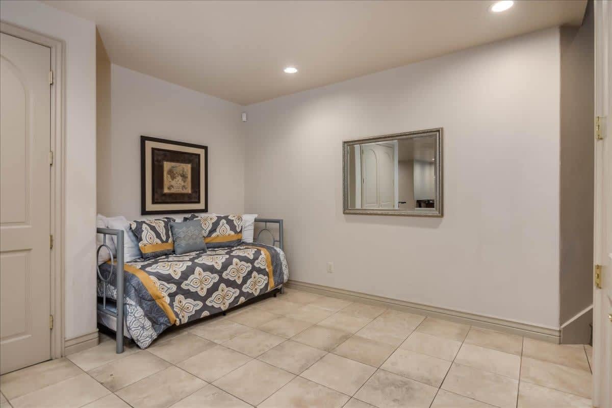 Full/trundle at the base of the stairs in basement