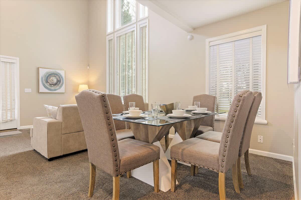 Open concept great room with wonderful dining table for 6