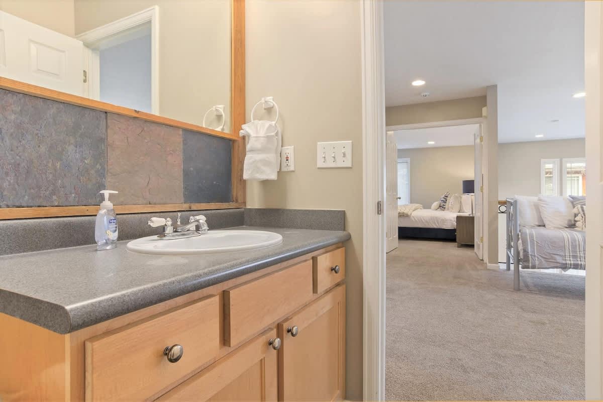 Hallway bathroom opens to loft and bedroom 2 and 3