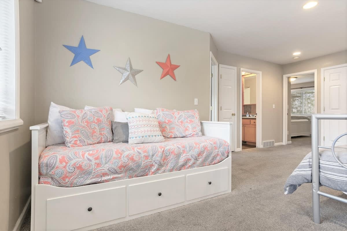 Upper loft with twin day bed and additional twin bed