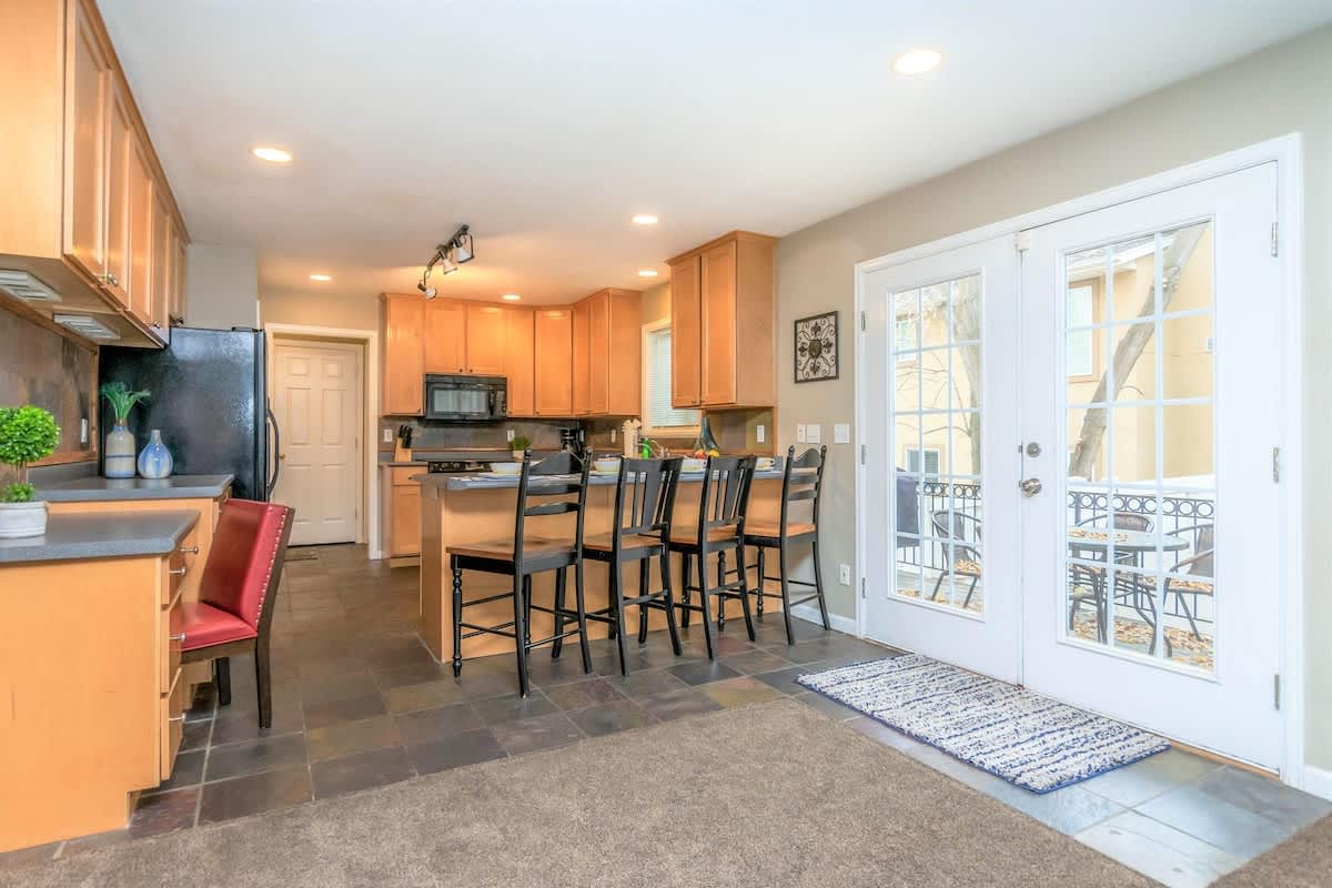 Fantastic kitchen with slate tile and bar seating