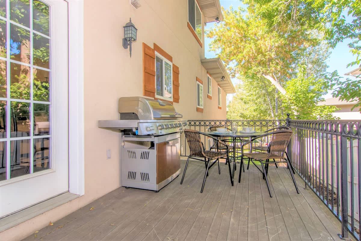 Private deck with a BBQ and seating
