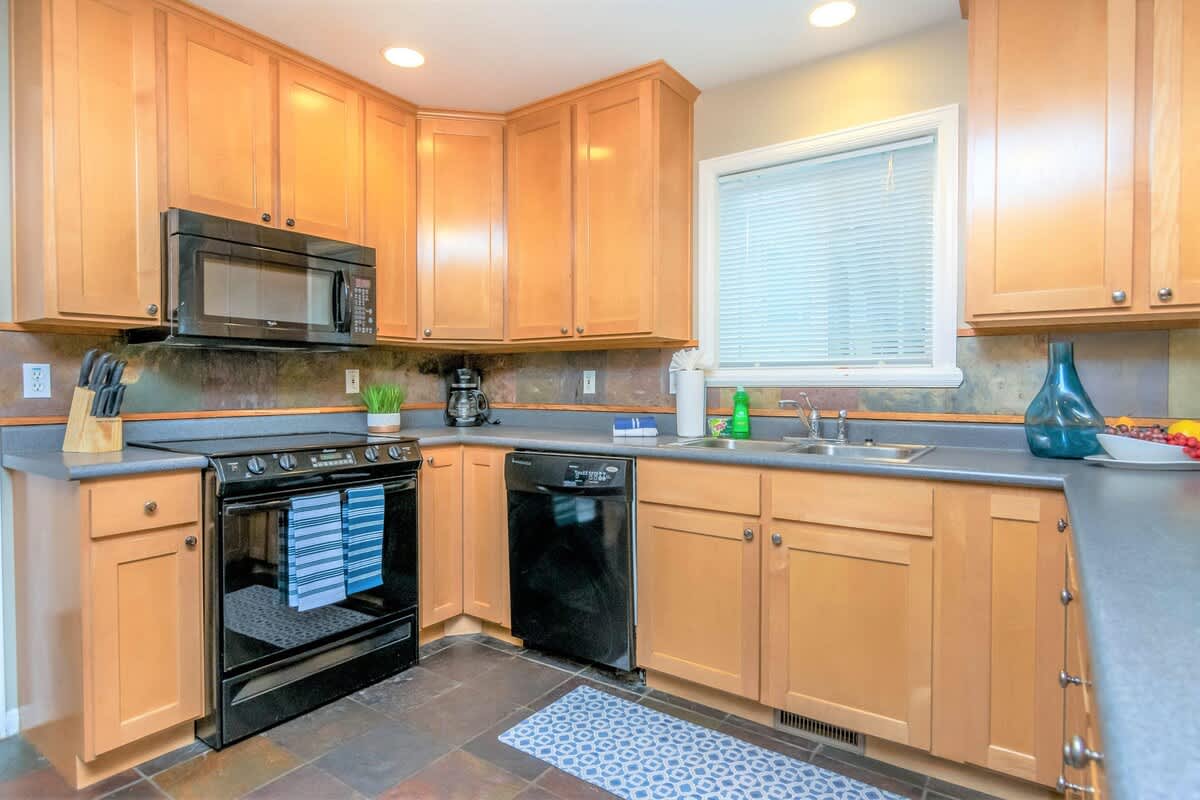 Kitchen with dishwasher and supplies