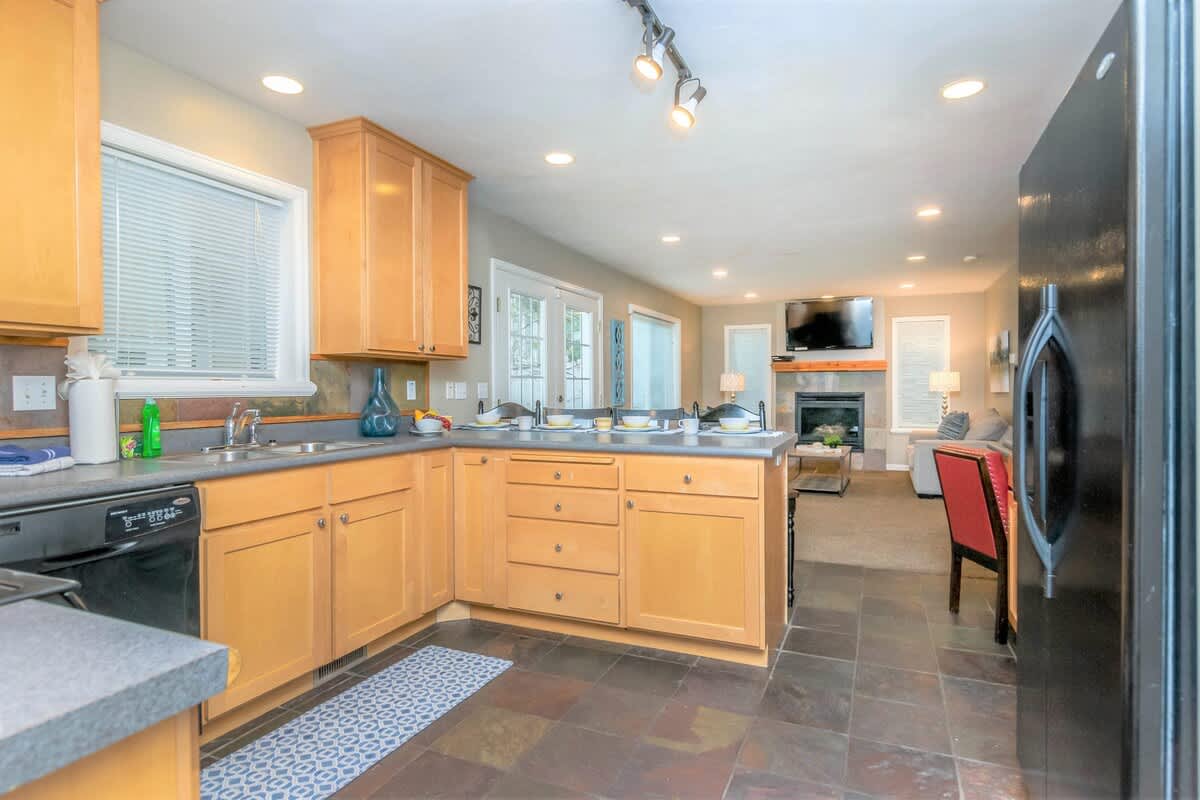 Gorgeous open concept kitchen looking into family room