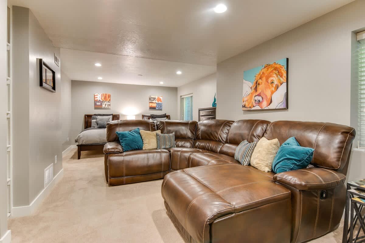 Basement recreation room with comfortable leather sectional