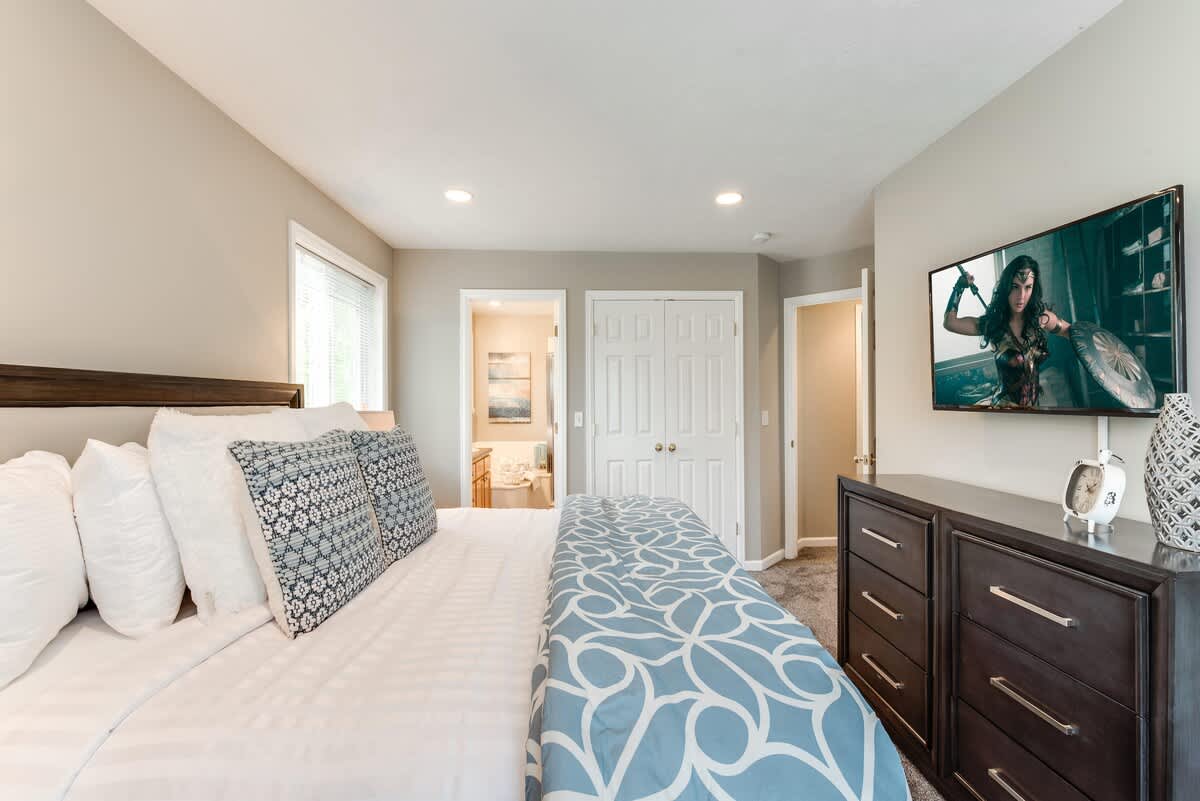 Upstairs, king bed, dresser, and TV
