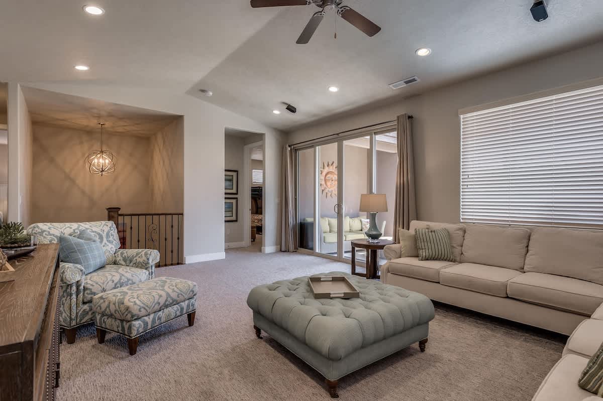 Family room upstairs with balcony fire pit and private hot tub