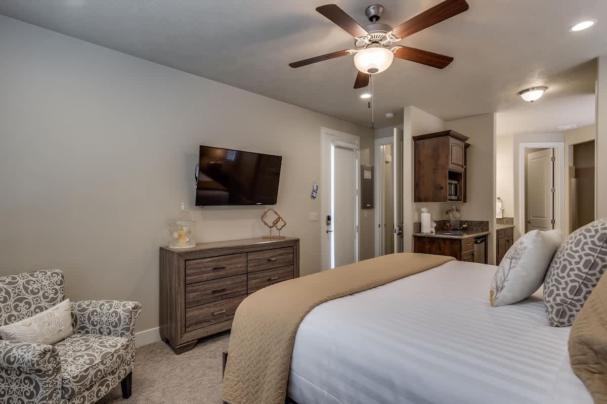 Master bedroom on main level with king bed