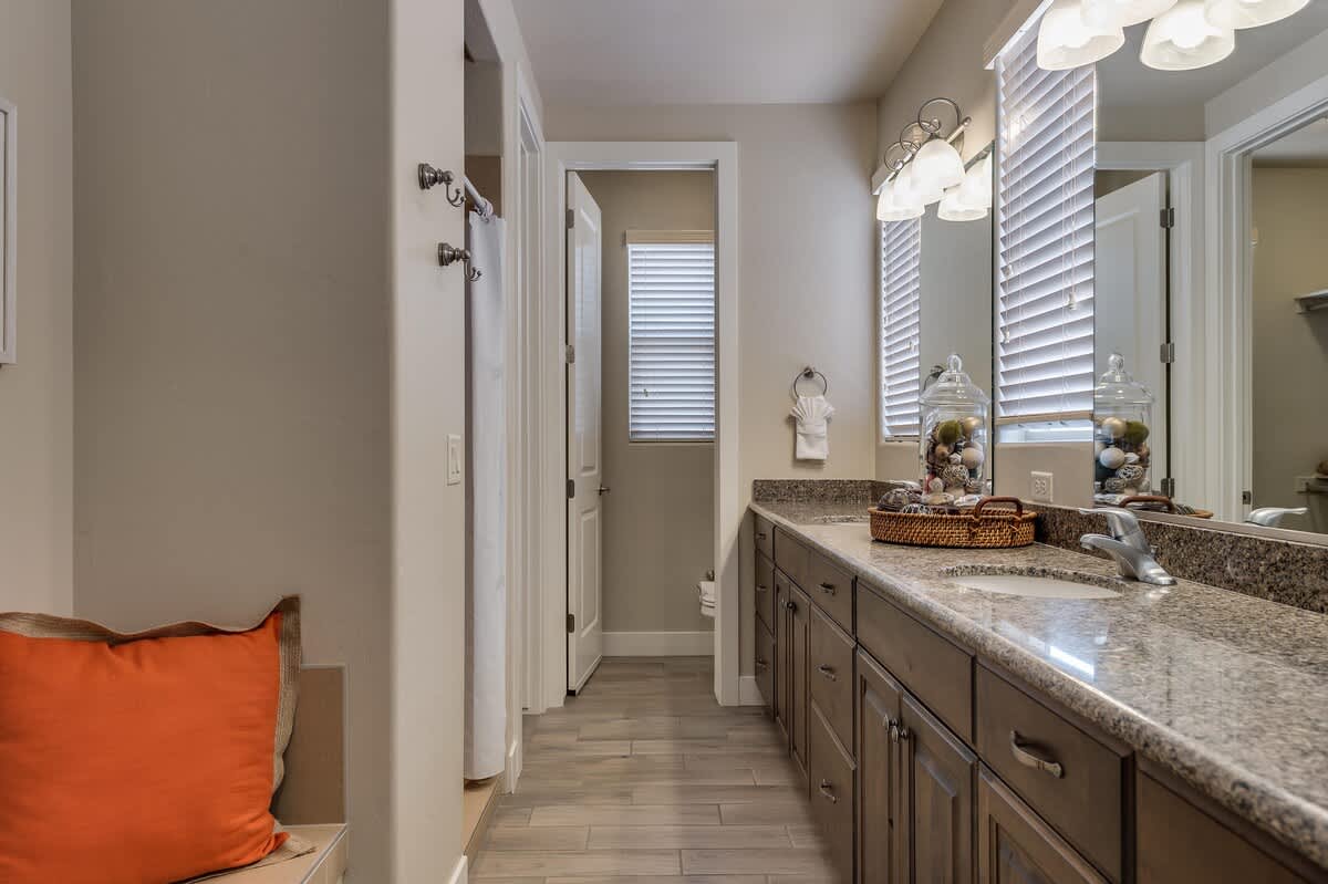Large bathroom for bedroom 2 with dual sinks and shower
