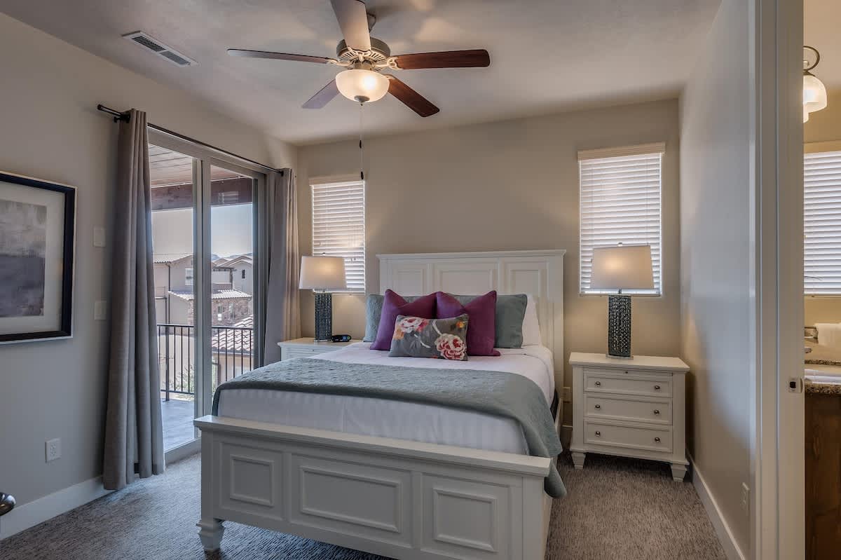 Master bedroom 3 with queen bed and covered balcony
