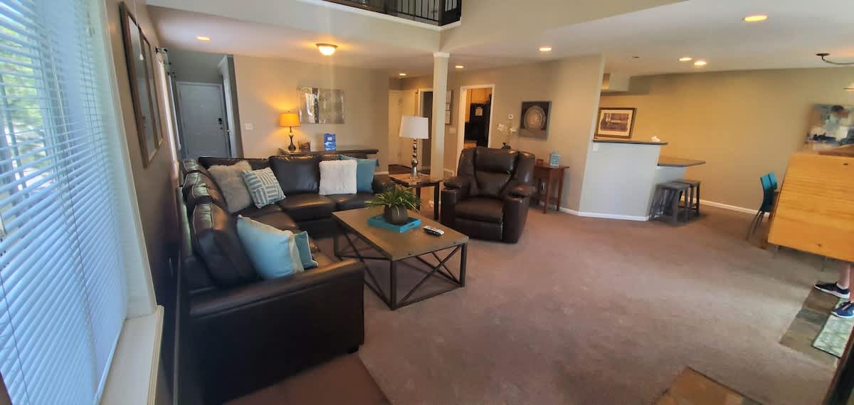 Relaxing family room open to kitchen and upper loft 