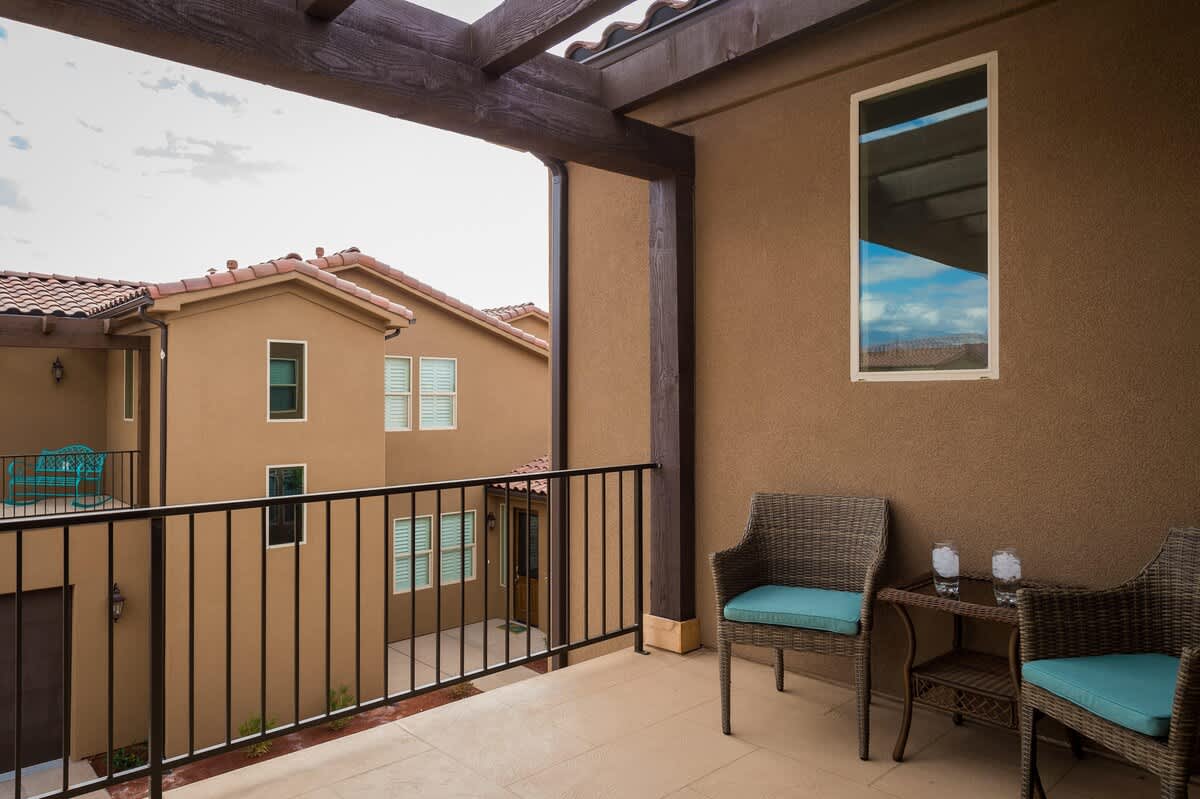  Private covered balcony off master bedroom 2 with 2 chairs
