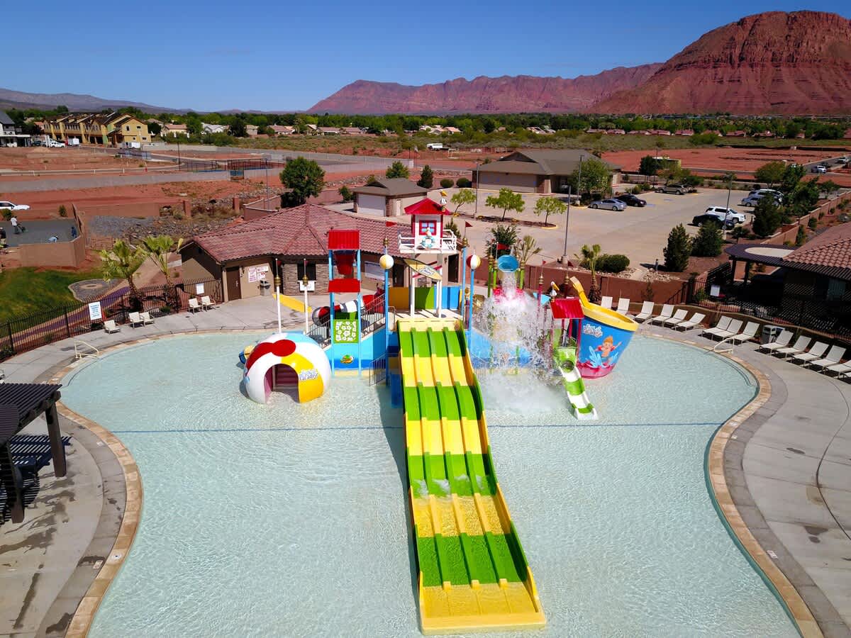 Aerial view of private water park with water slides and lazy riv