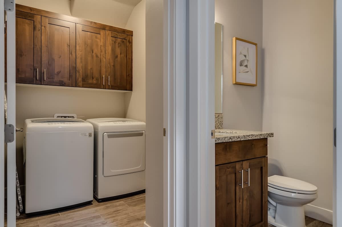 Half bathroom and laundry room on the main level
