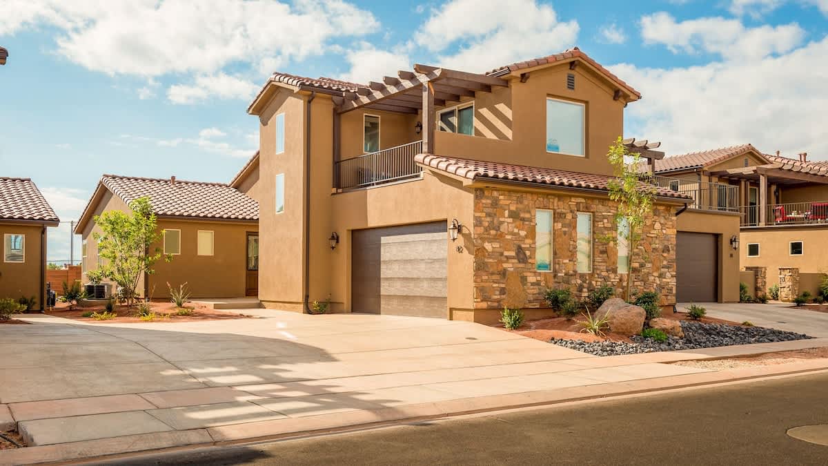 Gorgeous home with upper balcony and close to pools