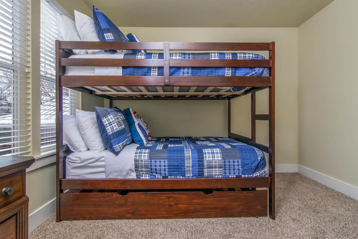 Full-size bunk bed with a twin trundle