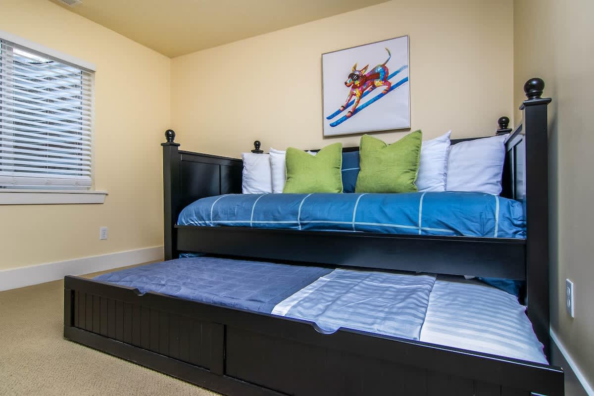 Twin day bed with a twin trundle