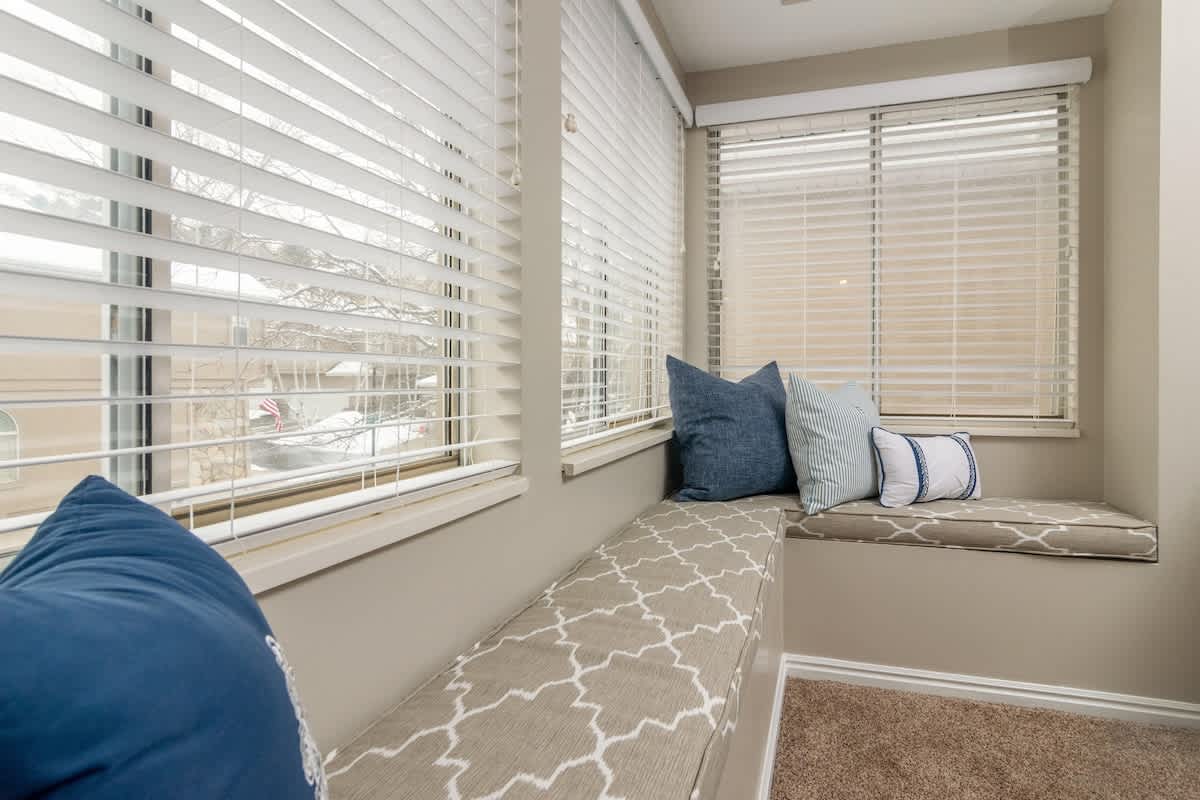 Master bedroom with unique window seat to enjoy mountains