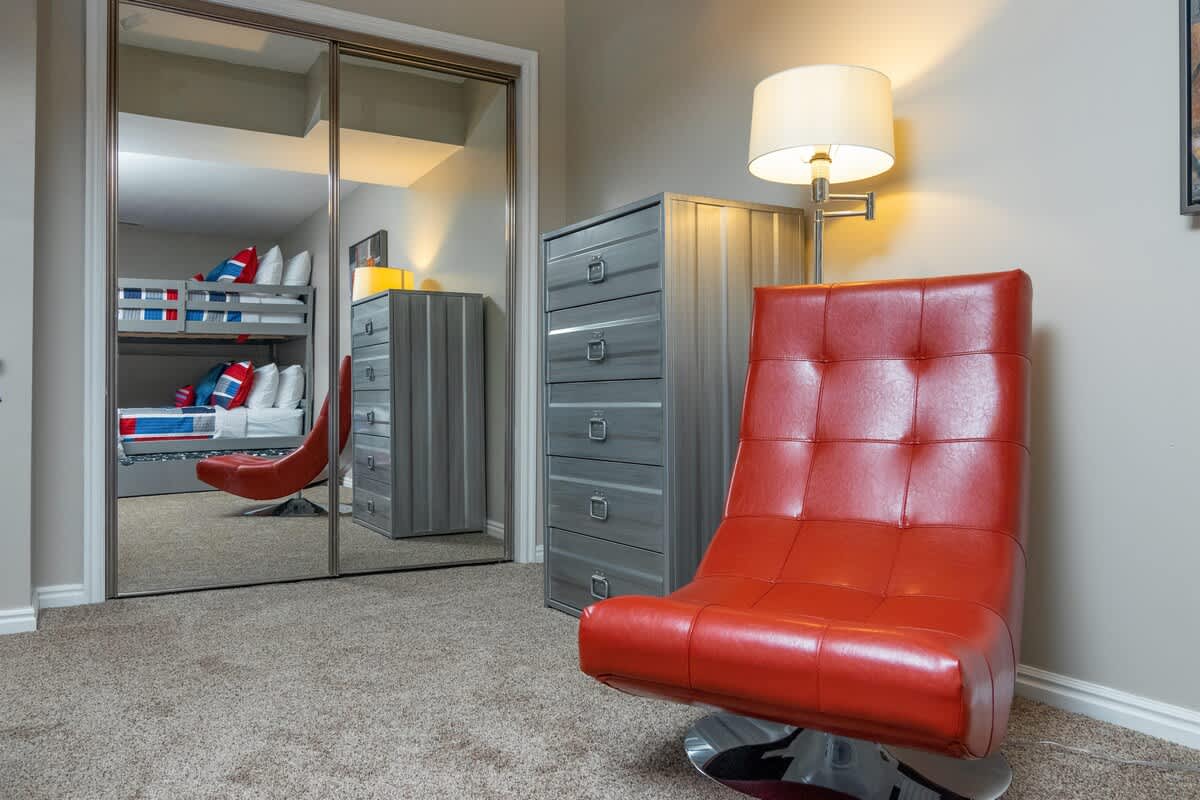 Bunk room with cool retro chair