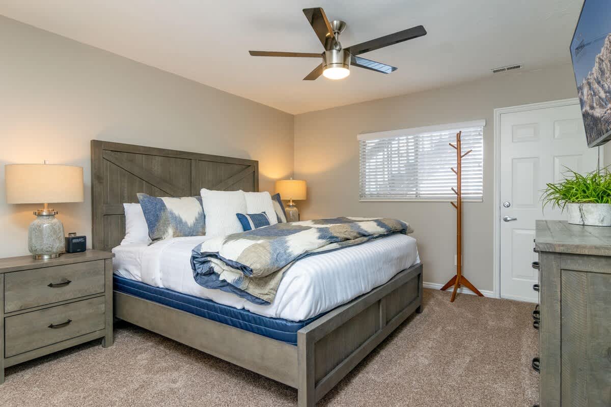 Bedroom 2 with king bed and TV