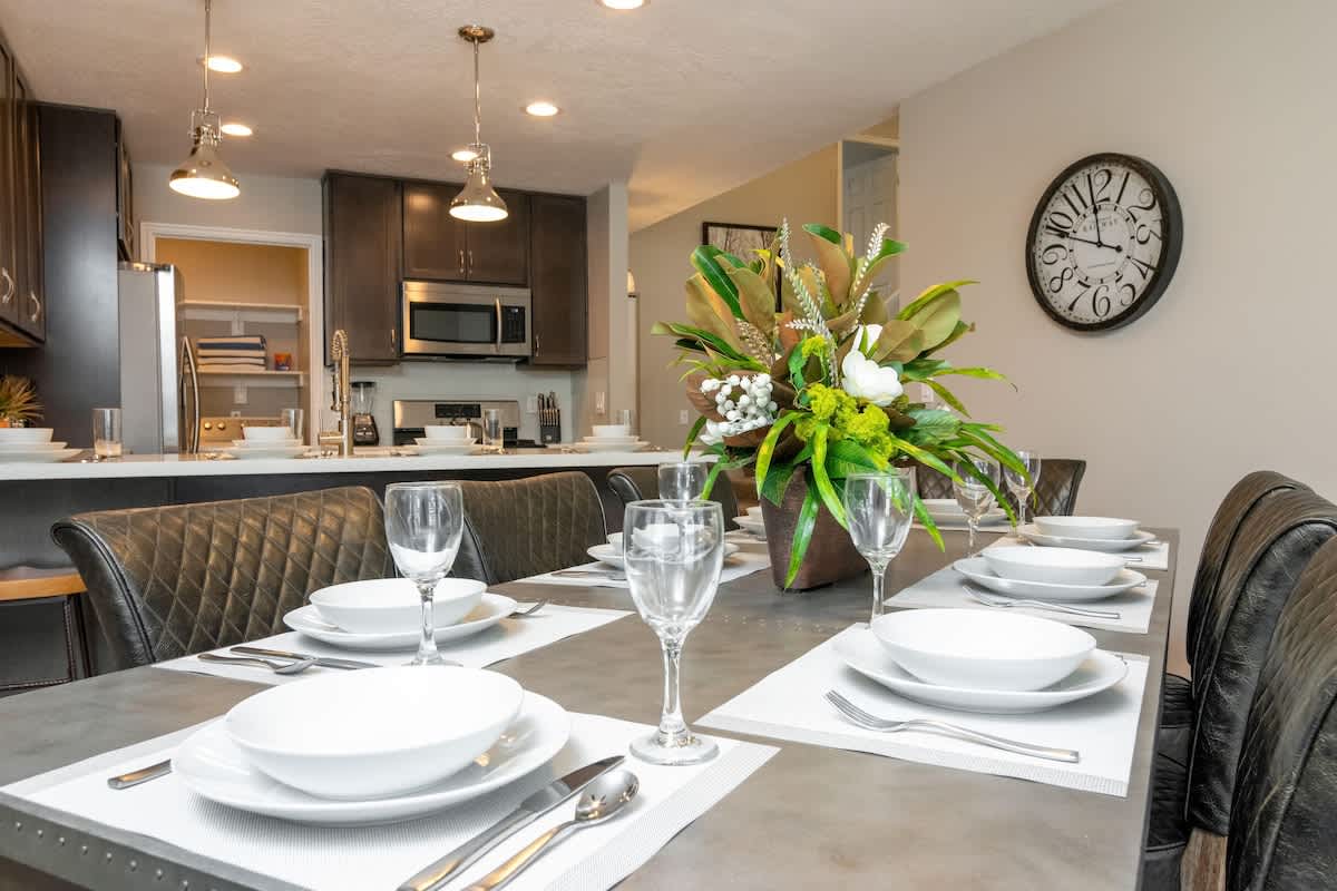 Dining table with nice serve-ware for enjoyable meals