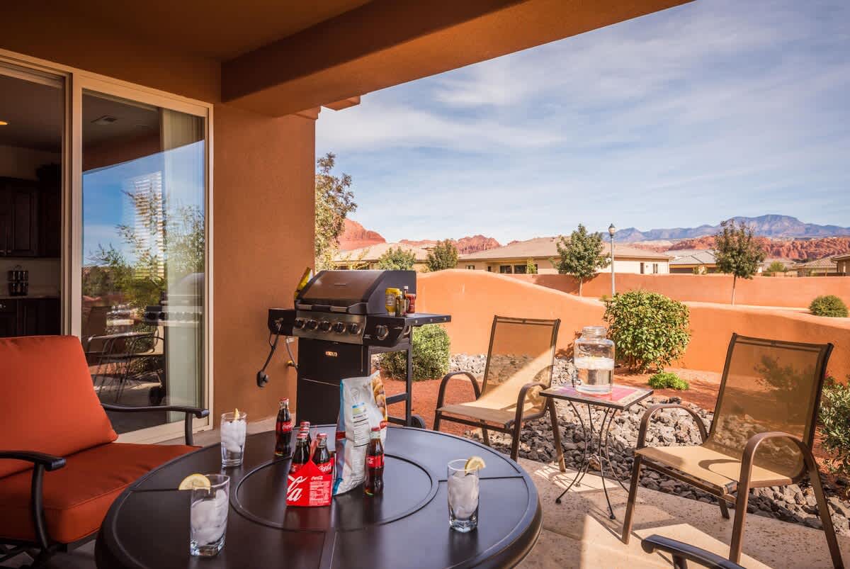 Nice covered patio with BBQ and seating wtih great red rock view